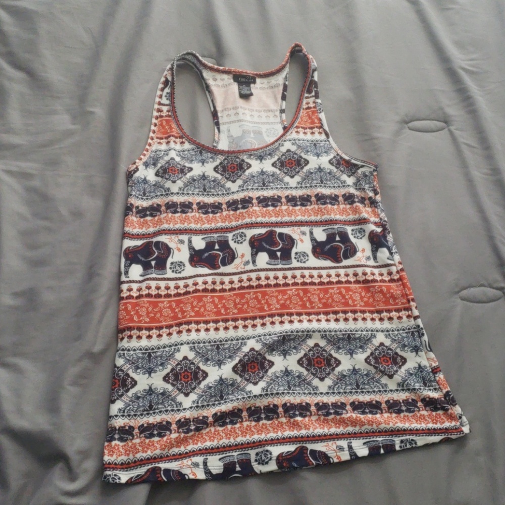 Tank top from Rue21. Fits like a Medium.